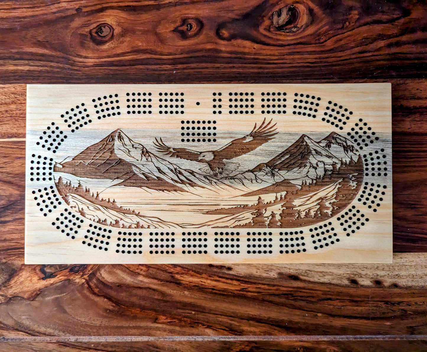 Bald Eagle flying over a valley 4 Track Cribbage Board - Laser engraved