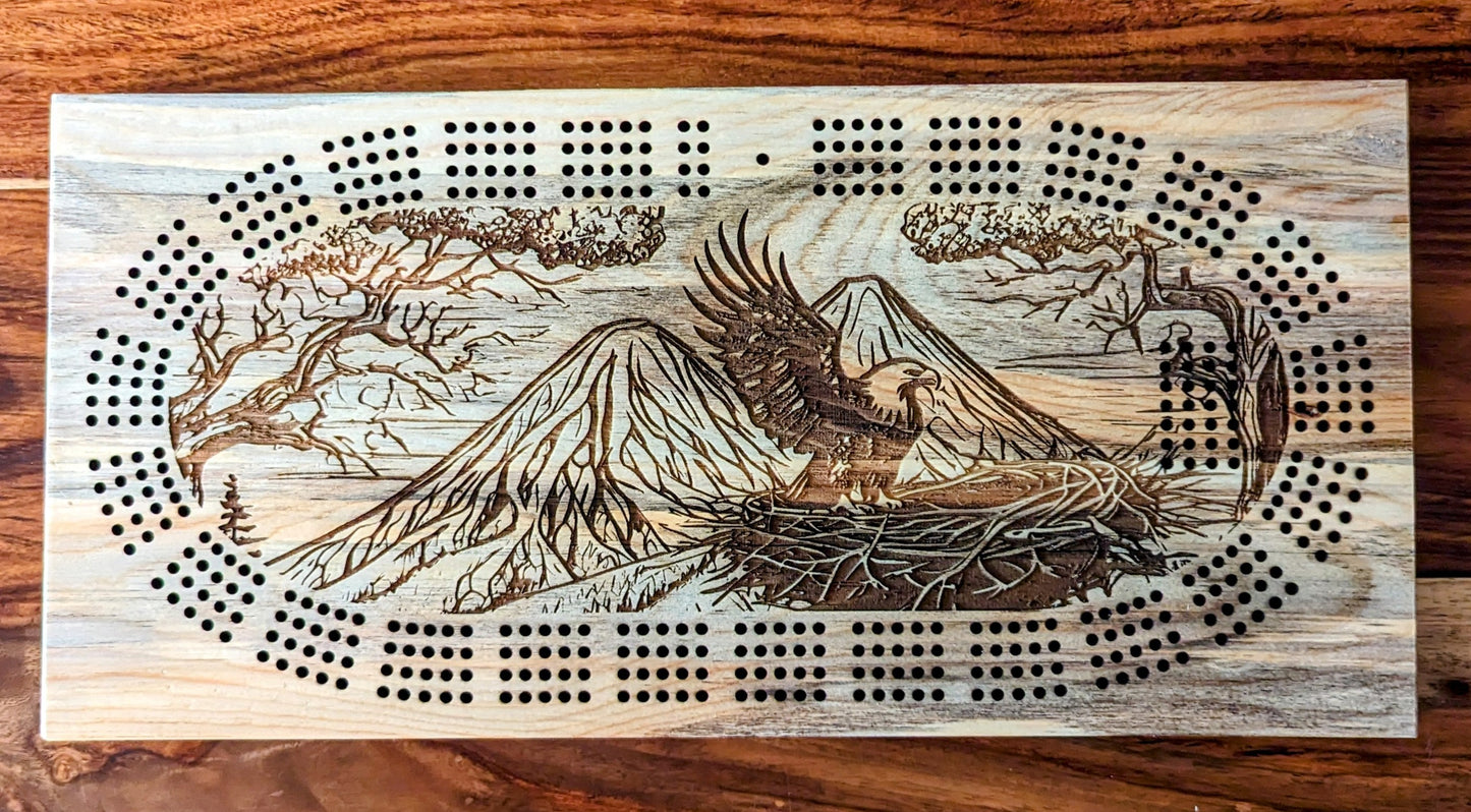 Bald Eagle on a nest with a mountain 4 Track Cribbage Board - Laser engraved