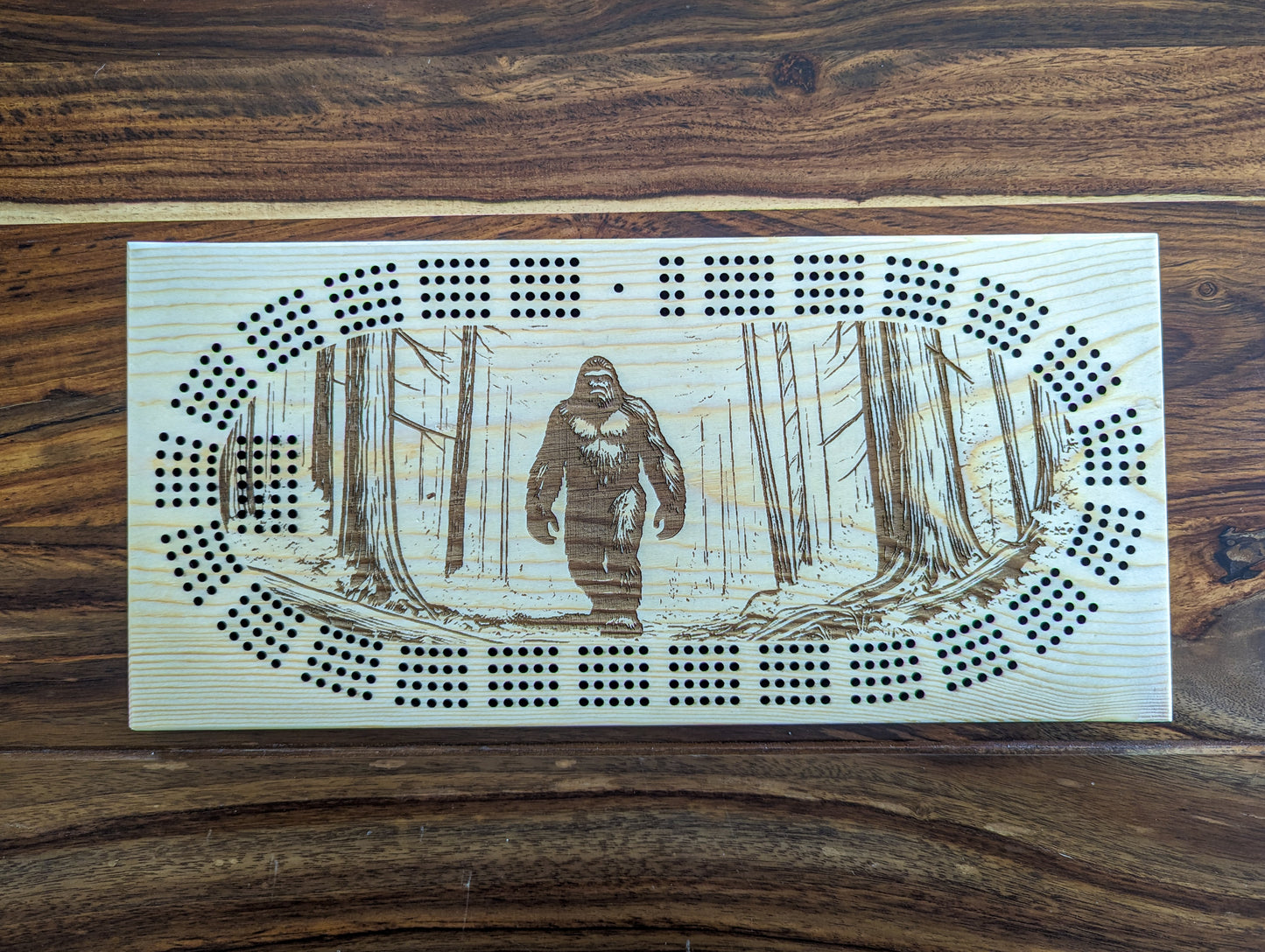 Bigfoot walking in the woods, 4 Track Cribbage Board