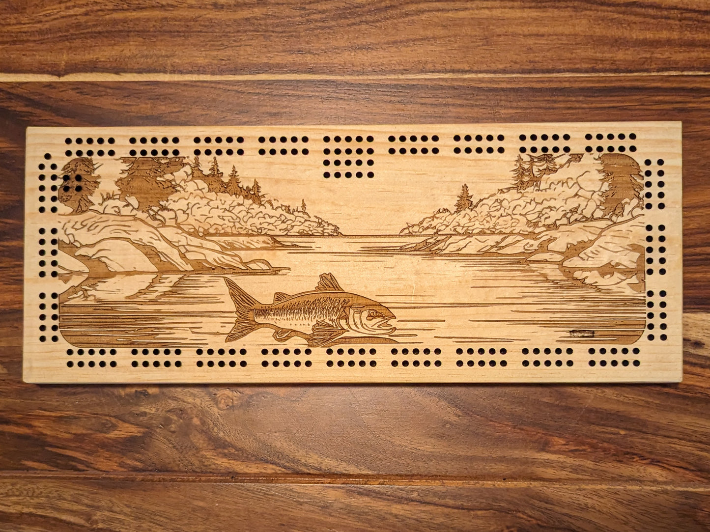 Fish swimming in a river, 2 Track Cribbage Board - Laser engraved